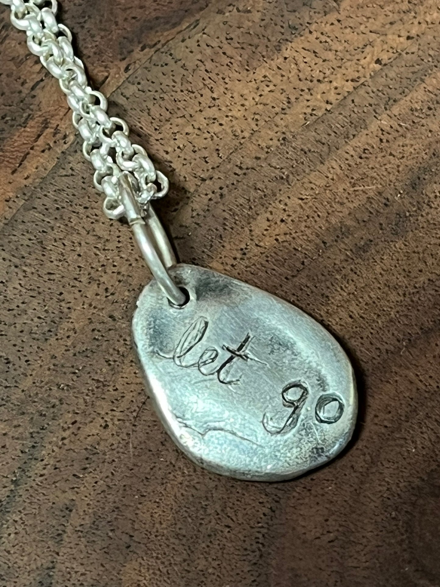 Textured Egg "let go" pendant