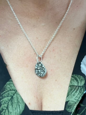 Textured Egg "let go" pendant