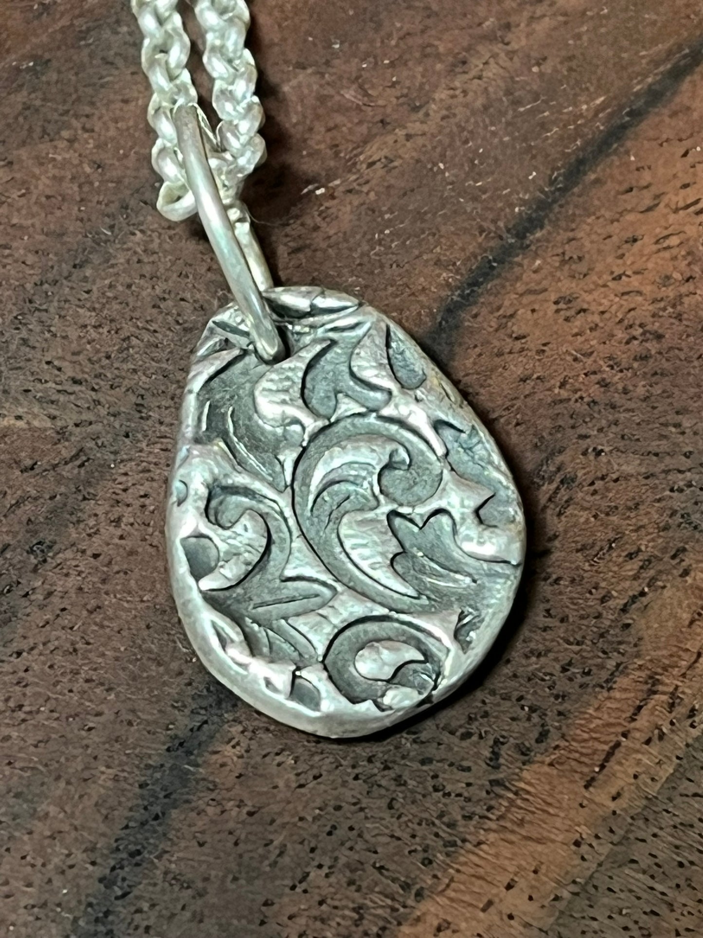 Textured Egg "let go" pendant